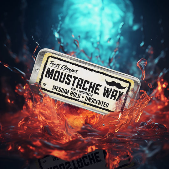 Moustache Wax Medium hold - First Element - For sculpting your moustache & holding in place throughout the day for a more sophisticated, clean look. Our wax comes in a sleek, handy rectangular slider metal 15g slider tin. Product shown on a water splash background.