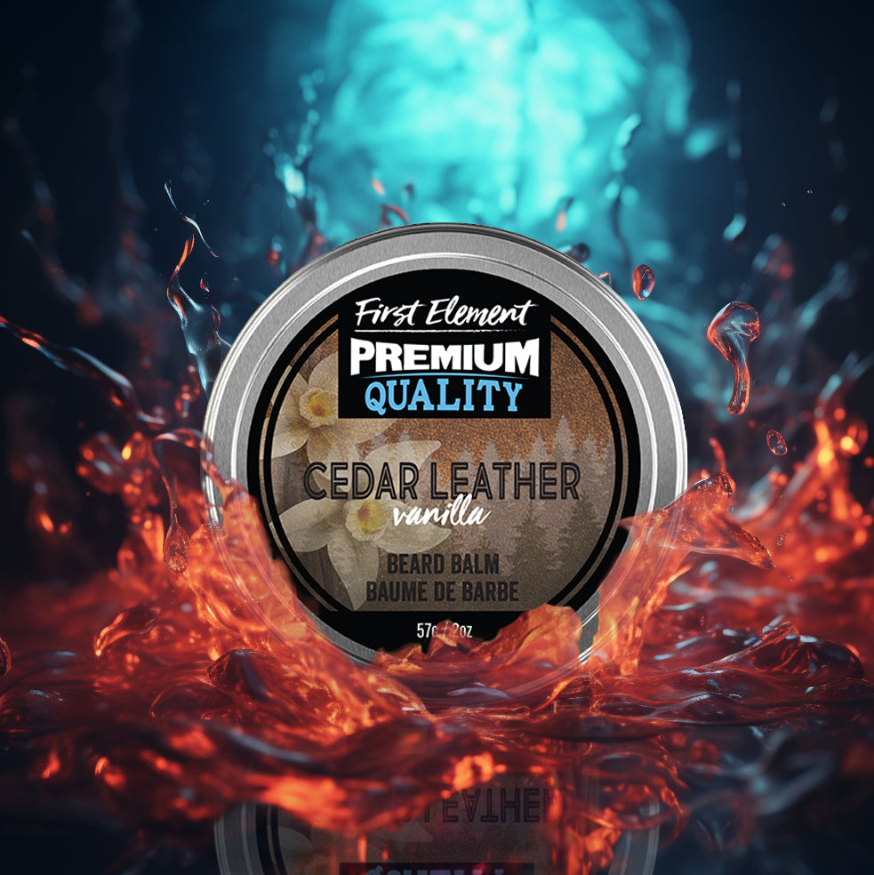 Image of a 2oz metal tin of Premium Cedar Leather scented Beard Balm from First Element, handcrafted in Canada. The tin has a screw-on top with a tamper-evident seal, set against a colorful splash background, showcasing its premium quality and all-natural, hand-poured formula.