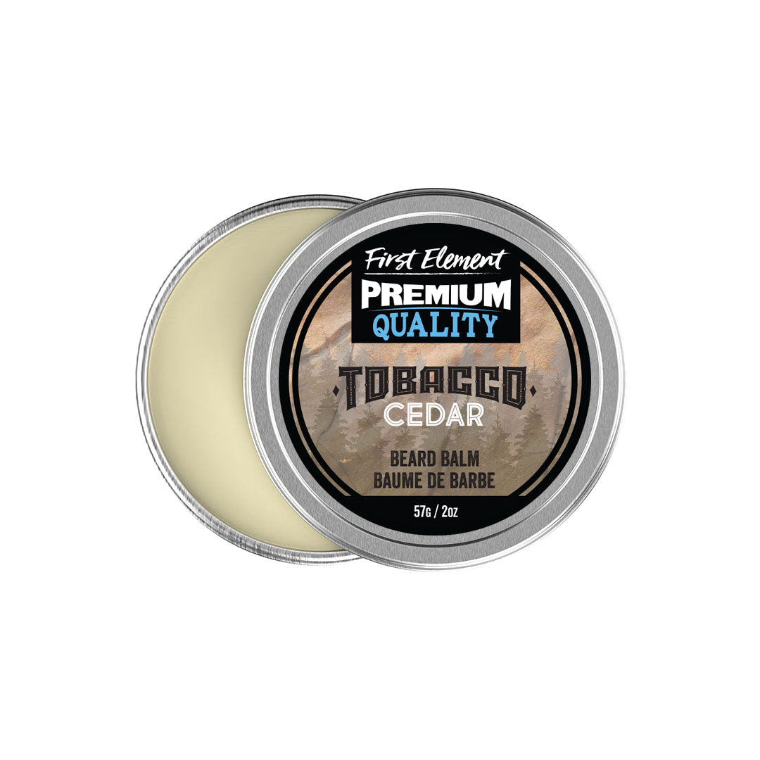 Image of a 2oz metal tin of Premium Tobacco Cedar scented Beard Balm, crafted in Canada. The tin features a screw-on top with a tamper-evident seal, emphasizing its premium quality and all-natural, hand-poured formula.