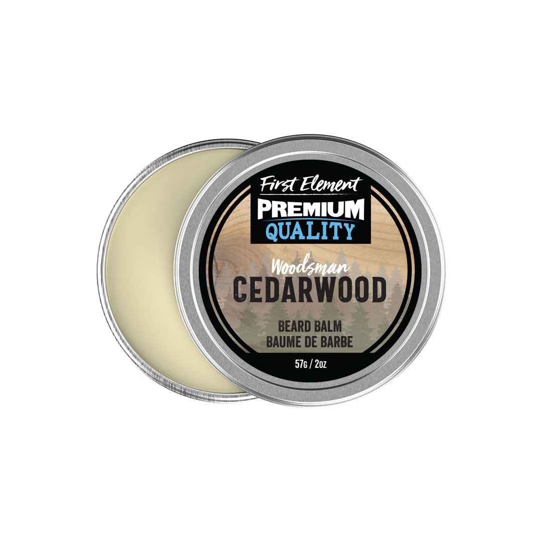 Image of a 2oz metal tin of Premium Cedarwood scented Beard Balm by First Element, handcrafted in Canada. The tin has a screw-on top with a tamper-evident seal, showcasing its premium quality and all-natural, hand-poured formula