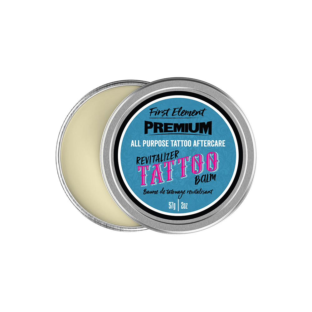 Tin of tattoo aftercare balm with blue label on a white background