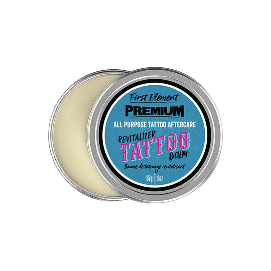 Tin of tattoo aftercare balm with blue label on a white background