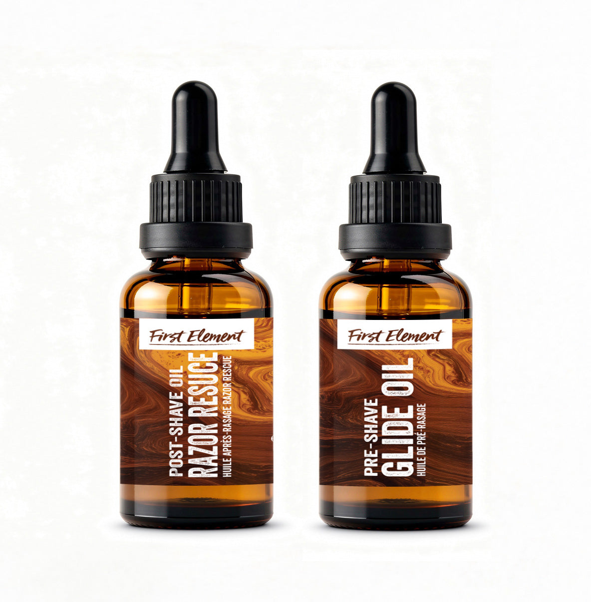 Two bottles of First Element grooming oils on a white background - The Complete Shave System Kit - Made in Canada
