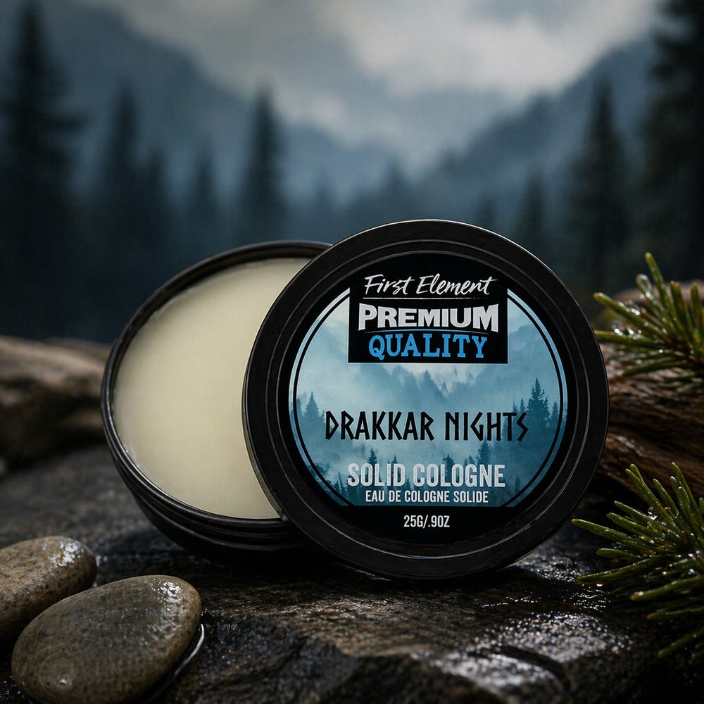Solid cologne container labeled 'Drakkar Nights' by First Element on a natural background with mountains.