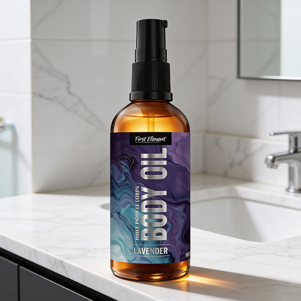Body oil bottle on a bathroom counter with marble tiles and sink in the background